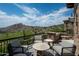 Stone patio with mountain views and comfortable seating at 11200 E Canyon Cross Way, Scottsdale, AZ 85255