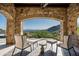 Relaxing patio with mountain views and comfortable seating at 11200 E Canyon Cross Way, Scottsdale, AZ 85255