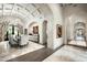 Grand entryway with marble flooring and arched hallways at 11200 E Canyon Cross Way, Scottsdale, AZ 85255