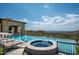 Luxury infinity pool and spa with mountain views and comfortable lounge chairs at 11200 E Canyon Cross Way, Scottsdale, AZ 85255