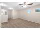 Loft bedroom with carpet, ceiling fan, and multiple windows at 4603 E Superior Rd, San Tan Valley, AZ 85143