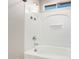 Clean bathroom with bathtub, shower, and window at 4603 E Superior Rd, San Tan Valley, AZ 85143