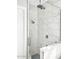 Modern shower with marble tile and glass enclosure at 28021 N 156Th St, Scottsdale, AZ 85262