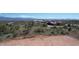 Desert lot with mountain views and some existing vegetation at 28021 N 156Th St, Scottsdale, AZ 85262