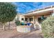 Landscaped backyard with flagstone pathway and desert plants at 18326 N Gila Springs Dr, Surprise, AZ 85374