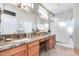 Large bathroom with double vanity and walk-in shower at 18326 N Gila Springs Dr, Surprise, AZ 85374