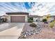 Single-story home with desert landscaping at 18326 N Gila Springs Dr, Surprise, AZ 85374