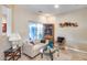 Cozy sitting area with sofa and glass-top coffee table at 18326 N Gila Springs Dr, Surprise, AZ 85374