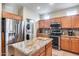 Modern kitchen with stainless steel appliances and granite countertops at 18326 N Gila Springs Dr, Surprise, AZ 85374