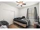 Small bedroom with a bed and closet at 7936 S 7Th Way, Phoenix, AZ 85042