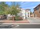 White exterior home with landscaping and driveway at 7936 S 7Th Way, Phoenix, AZ 85042