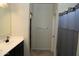 Clean bathroom with double vanity and walk-in shower at 31021 W Columbus Ave, Buckeye, AZ 85396