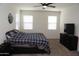 Spacious bedroom with large windows and plush carpeting at 31021 W Columbus Ave, Buckeye, AZ 85396