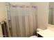 Clean bathroom with shower/tub combo and white vanity at 31021 W Columbus Ave, Buckeye, AZ 85396