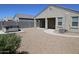 Backyard view showing hot tub and house exterior at 31021 W Columbus Ave, Buckeye, AZ 85396