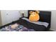 Cozy bedroom with a double bed and colorful bedding at 31021 W Columbus Ave, Buckeye, AZ 85396