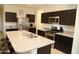 Spacious kitchen featuring stainless steel appliances and granite countertops at 31021 W Columbus Ave, Buckeye, AZ 85396
