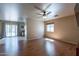 Open living room and kitchen area with tile floors at 7917 W Napoli St, Phoenix, AZ 85043