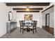 Bright dining area with wood beam ceilings and modern table set at 14015 N Hampstead Dr, Fountain Hills, AZ 85268