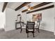 Bright dining area with wood beam ceilings and modern table set at 14015 N Hampstead Dr, Fountain Hills, AZ 85268