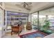 Sunlit home office features built-in shelving and city views at 7161 E Rancho Vista Dr # 6001, Scottsdale, AZ 85251