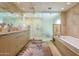 Luxurious bathroom with soaking tub and walk-in shower at 7161 E Rancho Vista Dr # 6001, Scottsdale, AZ 85251