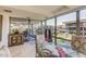 Modern dining area with glass table and access to balcony at 7161 E Rancho Vista Dr # 6001, Scottsdale, AZ 85251