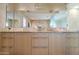 Modern bathroom with double vanity and large mirror at 7161 E Rancho Vista Dr # 6001, Scottsdale, AZ 85251