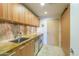 Convenient laundry room with washer, dryer, and utility sink at 7161 E Rancho Vista Dr # 6001, Scottsdale, AZ 85251
