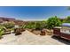 Outdoor patio with seating area, grill, and mountain views at 7161 E Rancho Vista Dr # 6001, Scottsdale, AZ 85251