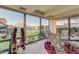 Sunlit dining area featuring a glass table and scenic views at 7161 E Rancho Vista Dr # 6001, Scottsdale, AZ 85251