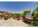 Outdoor patio with seating area, grill, and mountain views at 7161 E Rancho Vista Dr # 6001, Scottsdale, AZ 85251