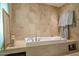 Relaxing bathtub with tiled surround at 7161 E Rancho Vista Dr # 6001, Scottsdale, AZ 85251