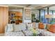 Living room with large sectional sofa and kitchen view at 7161 E Rancho Vista Dr # 6001, Scottsdale, AZ 85251