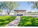 Relaxing pergola with seating area in the backyard at 10755 E Cholla Ln, Scottsdale, AZ 85259