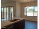 Modern kitchen with island, stainless steel appliances, and ample counter space at 21042 E Camina Buena Vis, Queen Creek, AZ 85142