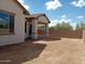 Covered patio with sliding glass doors leading to backyard at 21042 E Camina Buena Vis, Queen Creek, AZ 85142