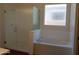 Bathroom features a large shower and a soaking tub with a window at 21042 E Camina Buena Vis, Queen Creek, AZ 85142