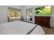 Main bedroom features a king-size bed and large TV at 7056 E Mighty Saguaro Way, Scottsdale, AZ 85266