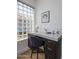 Stylish vanity with quartz countertop and block glass window at 7056 E Mighty Saguaro Way, Scottsdale, AZ 85266