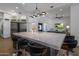 Modern kitchen with large island, stainless steel appliances, and ample counter space at 7056 E Mighty Saguaro Way, Scottsdale, AZ 85266