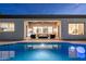 Stunning pool and patio area with a view through the house to the front yard at 7056 E Mighty Saguaro Way, Scottsdale, AZ 85266