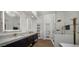 Elegant bathroom with double vanity and walk-in shower at 7056 E Mighty Saguaro Way, Scottsdale, AZ 85266