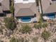 An aerial view of a kidney-shaped pool in a backyard at 7056 E Mighty Saguaro Way, Scottsdale, AZ 85266