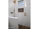 Elegant shower with glass enclosure, pebble flooring, and modern fixtures at 7056 E Mighty Saguaro Way, Scottsdale, AZ 85266