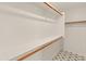 Walk-in closet with double hanging rods and shelving at 17613 N Kimberly Way, Surprise, AZ 85374