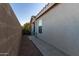 Side yard with a walkway and block wall at 1425 E Leslie Ave, San Tan Valley, AZ 85140