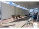 Covered patio with seating area and privacy walls at 2601 E Allred Ave # Br24, Mesa, AZ 85204