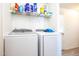Laundry room with washer, dryer, and ample storage at 2601 E Allred Ave # Br24, Mesa, AZ 85204