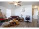 Cozy living room featuring a brown couch and wooden coffee table at 2601 E Allred Ave # Br24, Mesa, AZ 85204